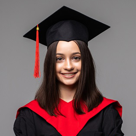 Portrait of funny excited joyful student girl with graduation certificate. Happy academy, college or university graduate standing against gray background, holding diploma and smiling at camera